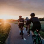 Sunset ahead of a group ride on bike trail. Photo by David Dvořáček on Unsplash.